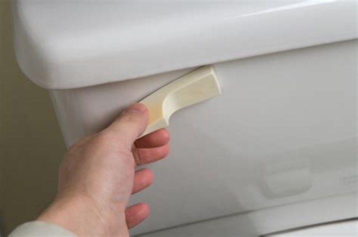 What causes toilet handle to be hard to flush?